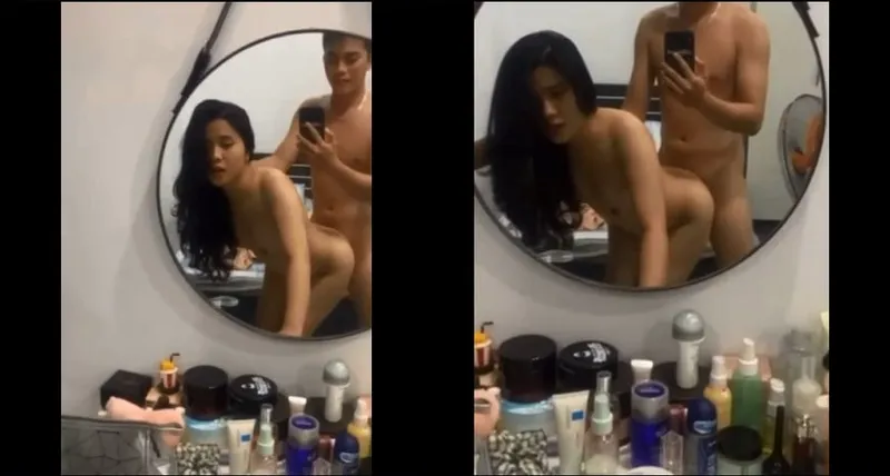 Nắc em học sinh xinh như hoa trước gương